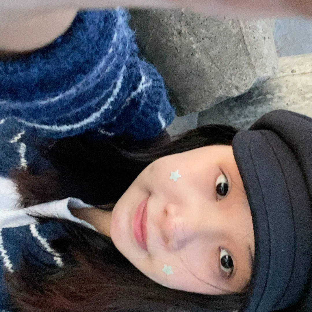 An’s selfie with star stickers on her cheeks
