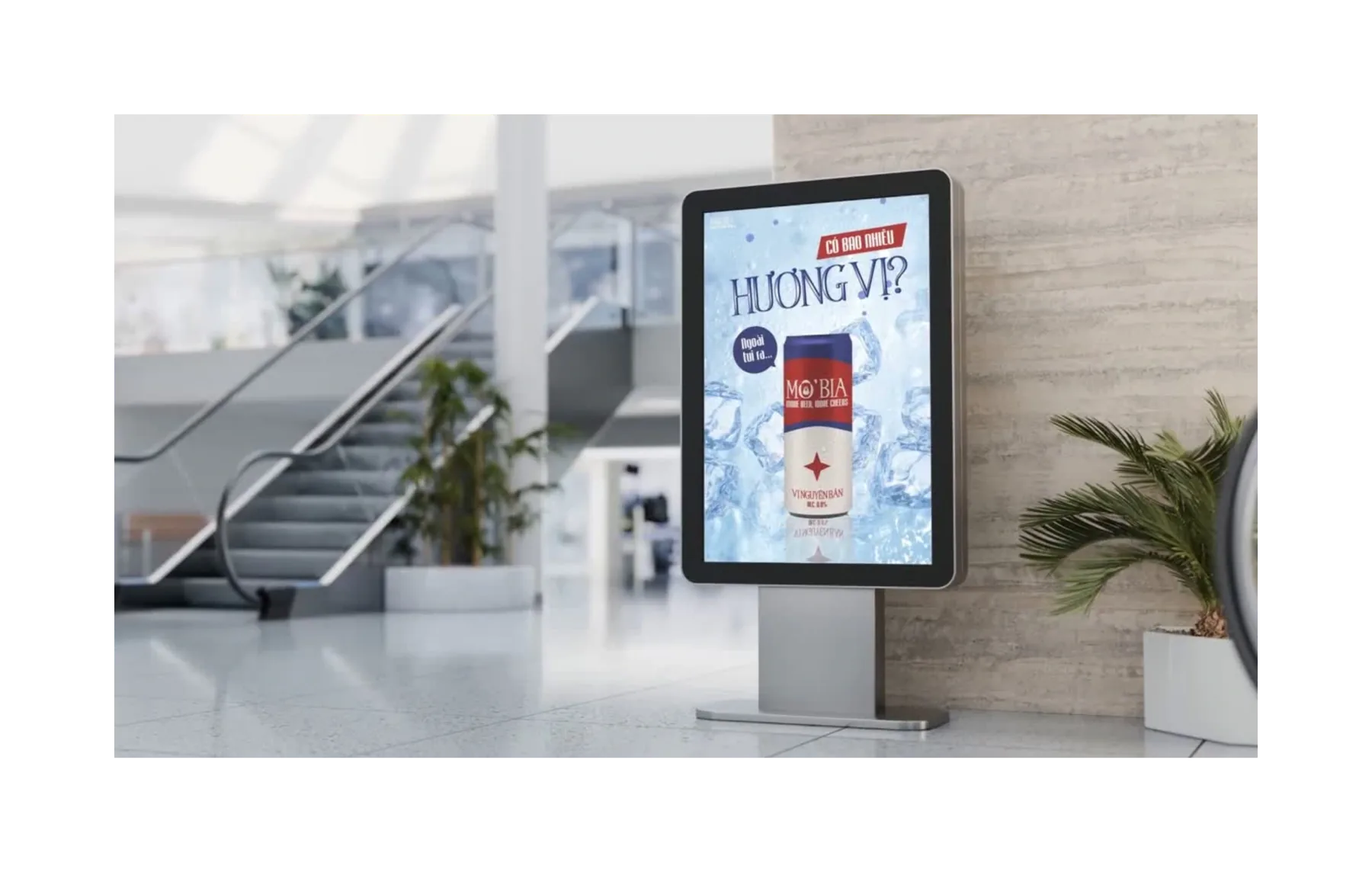 Advertising screen mockup by an escalator.